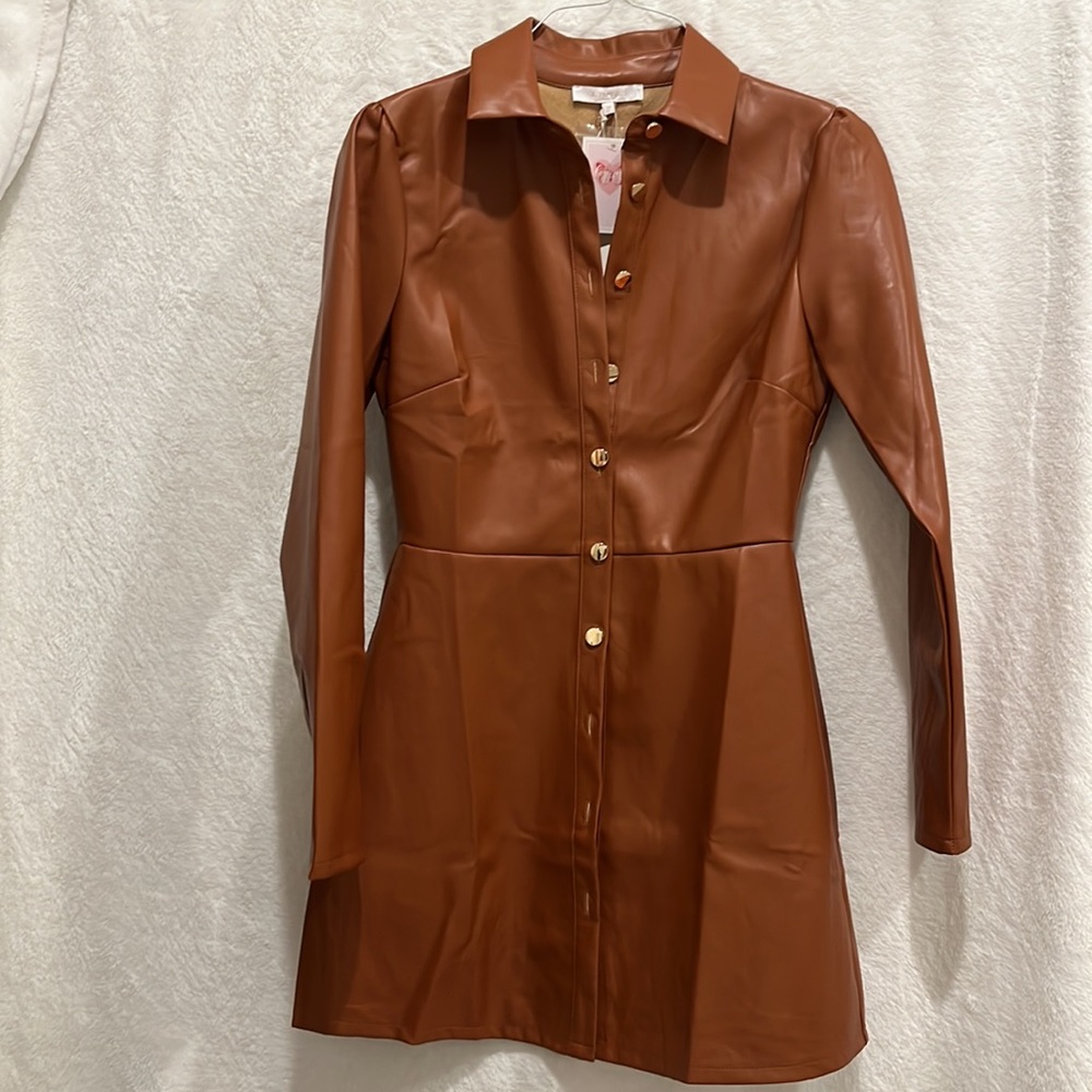 Brand new chestnut leather mini